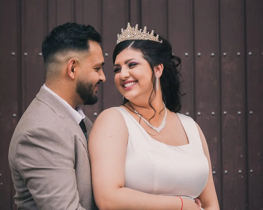 Gabriela smiles at Alen during their wedding photoshoot